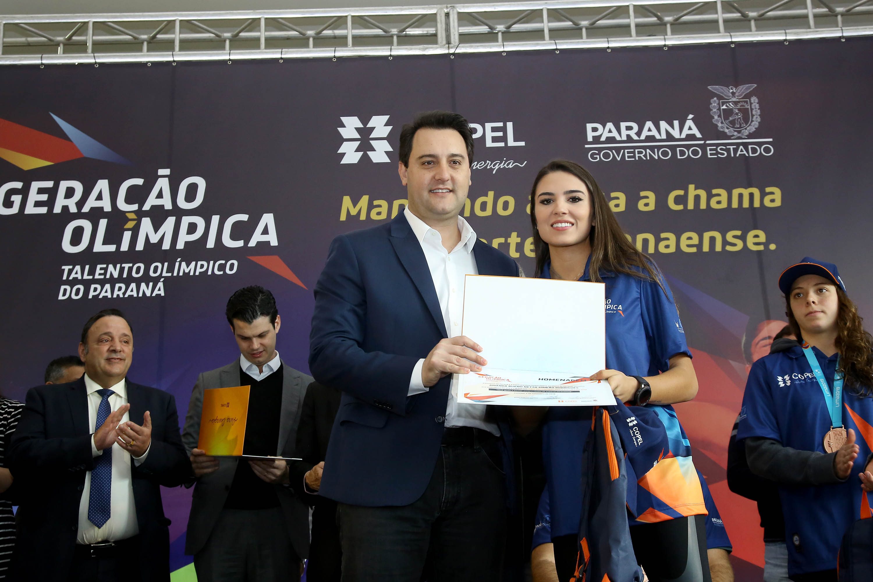 O governador Carlos Massa Ratinho Junior anunciou nesta segunda-feira (02), no Palácio Iguaçu, a nova fase do programa de apoio à formação de atletas olímpicos. Patrocinado pela Copel, o ?Geração Olímpica? é o maior programa de bolsa-atleta do País. Curitiba,02/09/2019 Foto:Jaelson Lucas /AEN