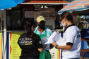 Polícia Científica do Paraná promove atividades lúdicas para crianças na praia de Caiobá