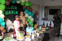 No Litoral, policiais militares realizam sonho de fã mirim em festa de aniversário