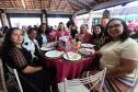 Mulheres prestigiam Feijoada Rosa da Portos do Paraná