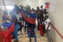 SEED - Inclusão: comunidade haitiana celebra identidade e cultura no Ceebja de Cascavel