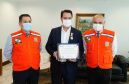 Ratinho Junior fez reconhecimento ao trabalho dos profissionais durante cerimônia reservada. O governador Ratinho Junior foi agraciado com a Medalha de Mérito da Casa Militar e a Medalha de Mérito da Defesa Civil. Foto: Rodrigo Felix Leal