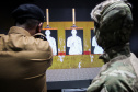 Policiais militares que trabalham na Companhia de Comandos e Serviços (CCS) e nas Diretorias da PM estão passando por instruções de tiros no caminhão de simulador de tiros da Polícia Civil do Paraná.  -  Curitiba, 25/02/2021  -  Foto: Soldado Amanda Morais