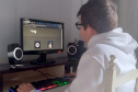 Aluno do EduTech desenvolve site de notícias sobre música.  Willian Mateus Uss (15), aluno do 1º ano do Ensino Médio do Colégio Estadual do Campo Professor Estanislau Wrublewski, no Distrito de Santana, em Cruz Machado. Ele está desenvolvendo um site de notícias sobre os lançamentos do mundo do funk — gênero musical de que mais gosta.  -  Curitiba, 18/06/2021  -  Foto: SEED