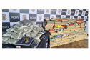 A Polícia Civil do Paraná (PCPR) apreendeu 1.492,46 quilos de maconha do crime organizado, na noite de sexta-feira (24), em estacionamentos na região central de Curitiba. Um homem e duas mulheres, de 27, 28 e 35 anos, foram presos em flagrante pelos crimes de tráfico de drogas, associação para o tráfico e posse ilegal de arma de fogo.  -  Curitiba, 27/09/2021  -  Foto: Polícia Civildo Paraná
