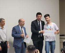 Olimpíada de Eficiência Energética  -  Paraná teve 306 medalhistas na competição; aluno de Curitiba e professora de Lidianópolis recebem prêmios de primeira colocação na sede da Aneel em Brasília -