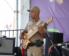 Nem a chuva afasta o público: Banda da PMPR agita o Palco Sunset em Shangri-lá
