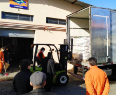 A Rede de Farmácias Nissei entregou nesta terça-feira (29) à Coordenadoria Estadual da Defesa Civil 1.200 cestas básicas que serão distribuídas a municípios e entidades de Curitiba e do Interior que atendem pessoas em situação de vulnerabilidade. A arrecadação é resultado da campanha “Teste Nissei. Negativo para a Fome”, que destinou R$ 15 de cada teste rápido de Covid-19 realizado durante o mês de maio  -  Curitiba, 30/06/2021   -  Foto: Defesa Civil
