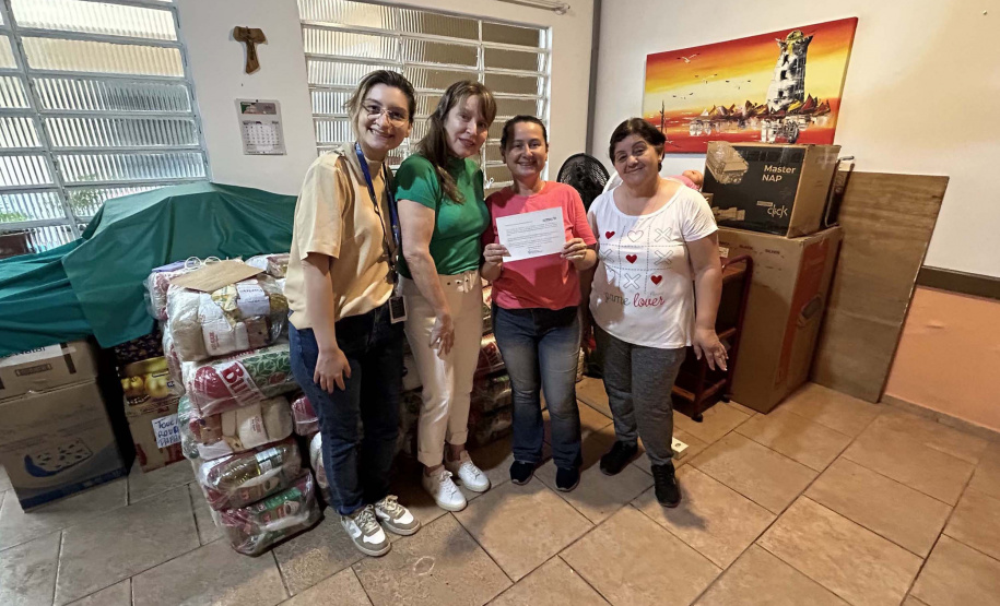 Cestas básicas arrecadadas na Corrida do Porto são distribuídas em Paranaguá
