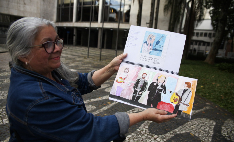 Fã da Orquestra Sinfônica do Paraná e de Beatles, artista ilustra concertos há mais de uma década