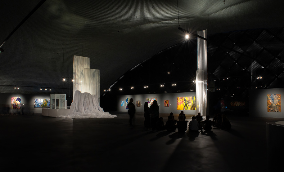 Exposição Através